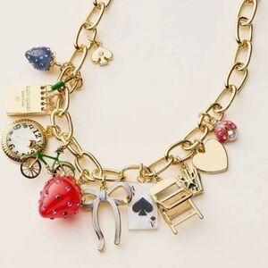 Elegant Gold and Red Charm Necklace